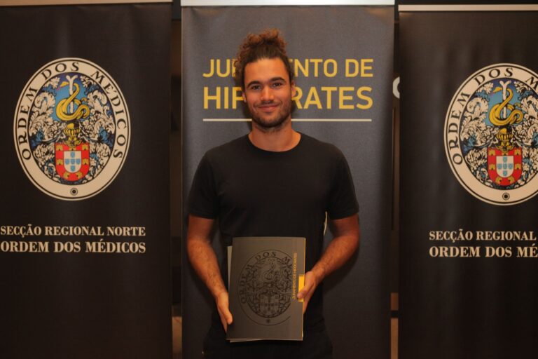Befriend Your Emotions Filipe at the Hippocratic Oath ceremony, holding his certificate